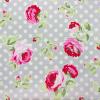 Grijs met witte dots en grotere rozerode rozen