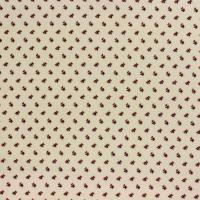 Licht creme met klein rood en zwart figuurtje